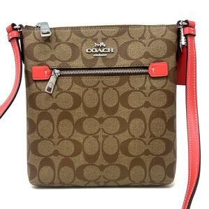 Coach Mini Rowan File Bag Crossbody In Signature Canvas Khaki Tangerine CF340
